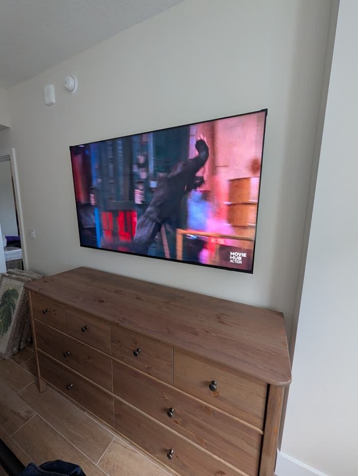 Finished install, TV mounted above dresser