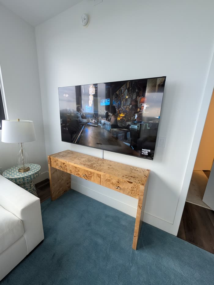 Finished install, TV mounted above console table